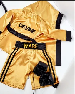Gold satin kickboxing set with black trim and boxing gloves