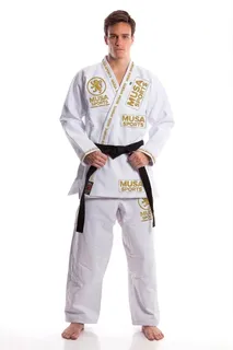 White MUSA SPORTS WEAR BJJ gi worn by an athlete with gold academy branding
