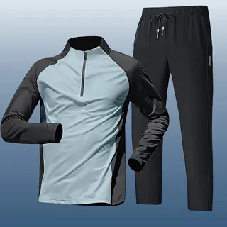 Light blue and black quarter-zip performance top with matching training pants